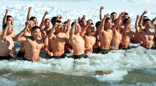 Soldiers train in the ice cold water in Gangwon Province.