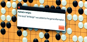 돌 던진 알파고 - 알파고가 착점을 표시하는 모니터 화면에 ‘AlphaGo resigns(알파고는 포기한다)’라는 팝업 창을 띄워 불계패를 선언한 모습. 