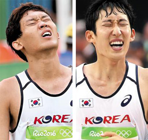 지난 22일 리우올림픽 남자 마라톤 경기에 출전한 한국 대표 심종섭(왼쪽)과 손명준이 결승선을 통과하는 모습.