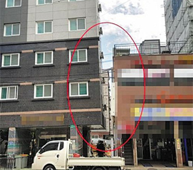 부산 사하구의 9층짜리 오피스텔 건물(왼쪽)이 왼쪽으로 기운 모습. 16가구 주민은 대피한 상태다.