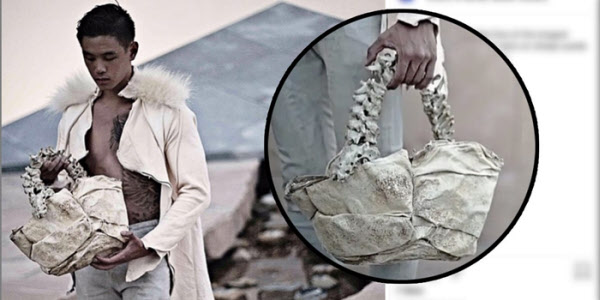 논란이 된 인간 등뼈 핸드백을 디자이너 아널드 푸트라가 들어 보이고 있다. /인사이더