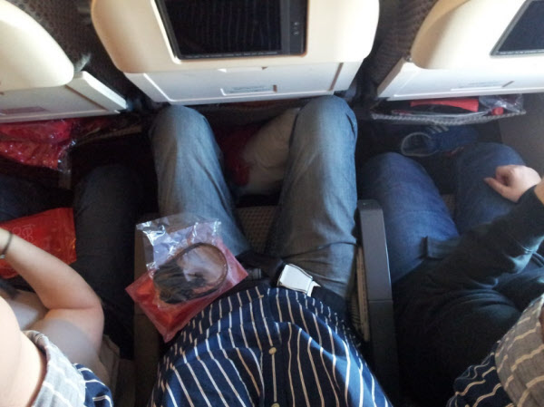 Photo / Flickr of occupied passenger seats in economy class seats on Virgin Atlantic in October 2012