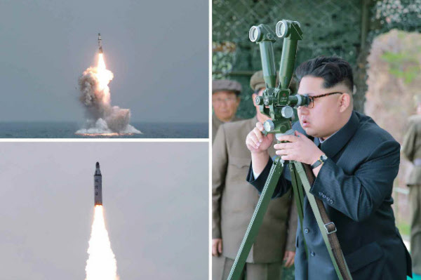 김정은이 2016년 잠수함발사 탄도미사일(SLBM) 수중시험발사를 보는 모습. /연합뉴스