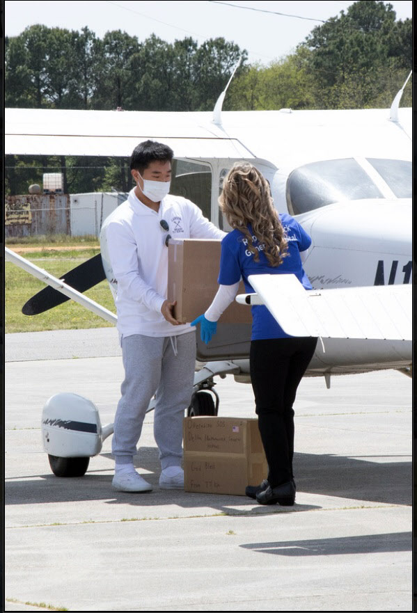 TJ Kim is delivering personal medical supplies brought to the aircraft / TJ Kim provided