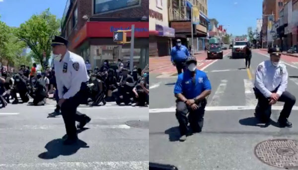 지난달 31일(현지 시각) 미국 뉴욕 퀸스에서 열린 집회에서 경찰들이 시위대와 함께 무릎을 꿇고 있다./로이터 연합뉴스
