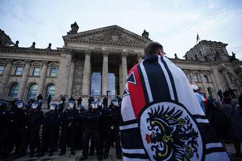 The Prussian flag appeared at the protest.  Far-rightists who miss old Germany often come to protest./EPA Yonhap News