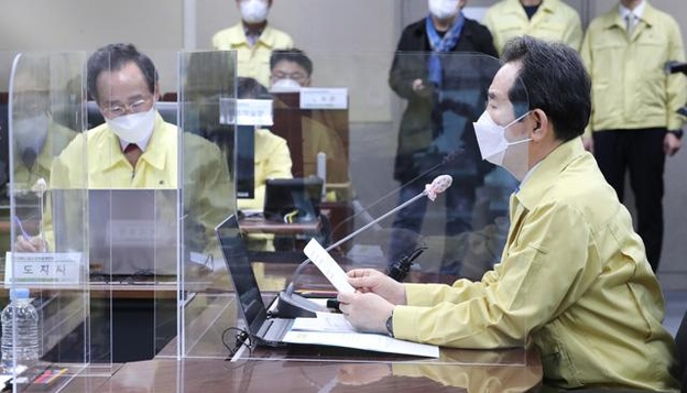 丁 국무 총리 “전국 보건소 누구나 무료 코로나 진단 검사”